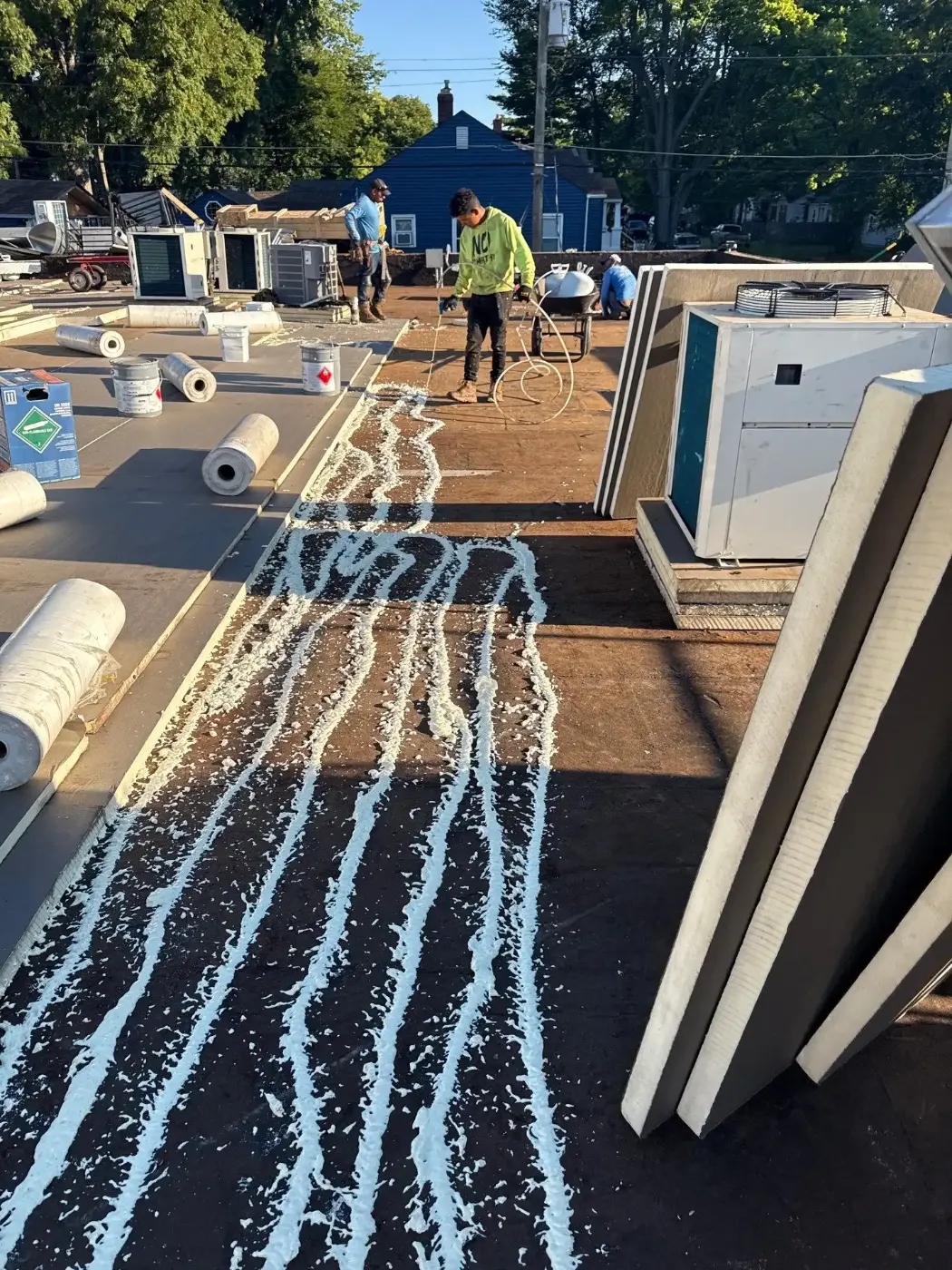 Tarping and dry-in on a Wholesale District commercial roof